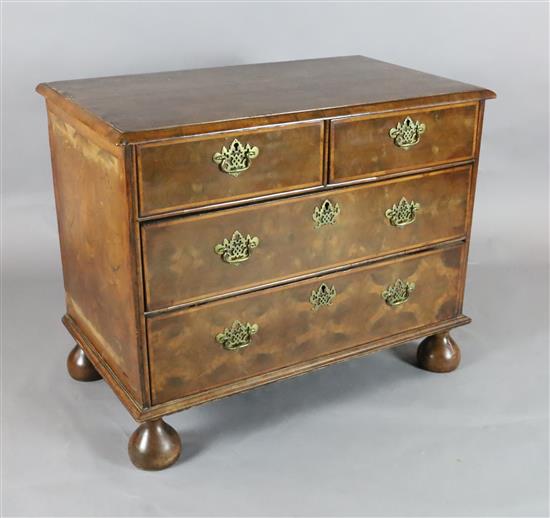 A William III oyster olivewood chest of drawers, c.1700, W. 3ft 3in., H. 2ft 7.5in., D. 22.5in.